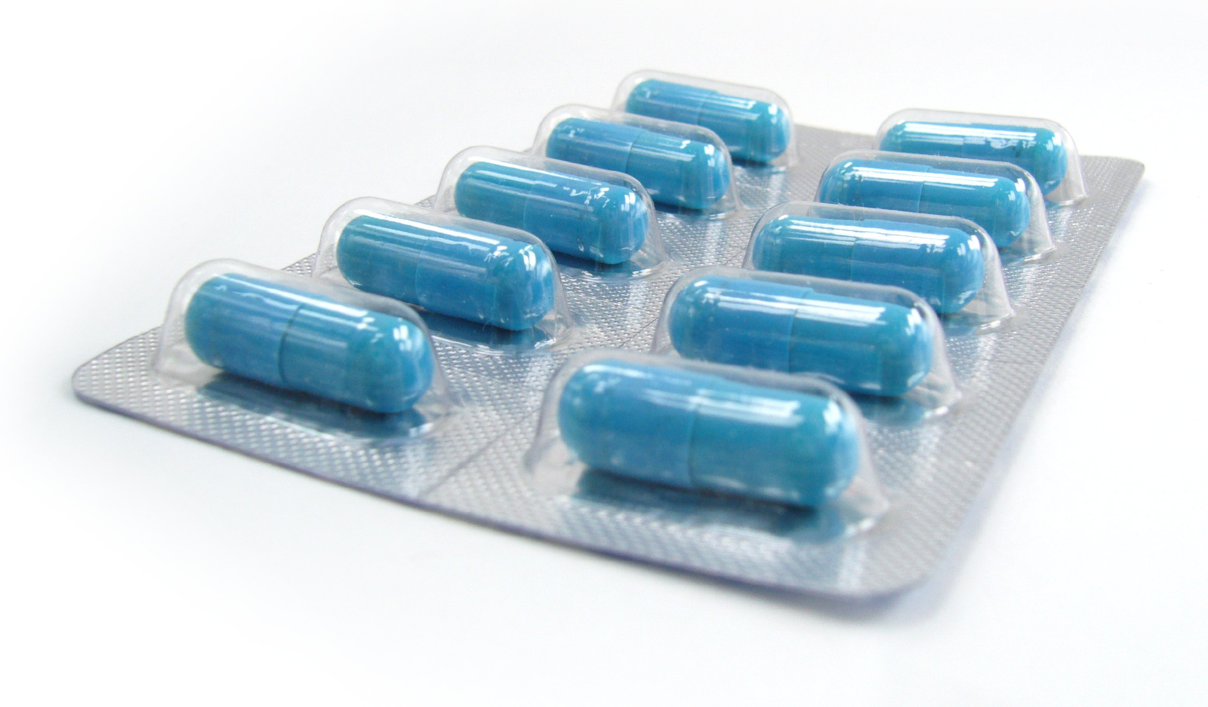 таблетки синего цвета круглые для мужчин фото